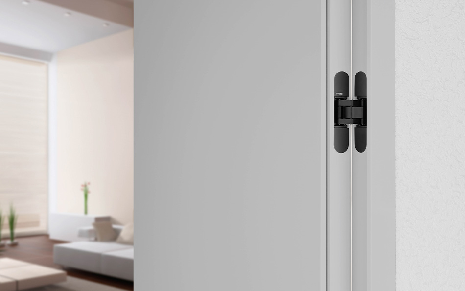 Black hinges on a white door offer a bold design statement. Black hinges on a white door offer a bold design statement.